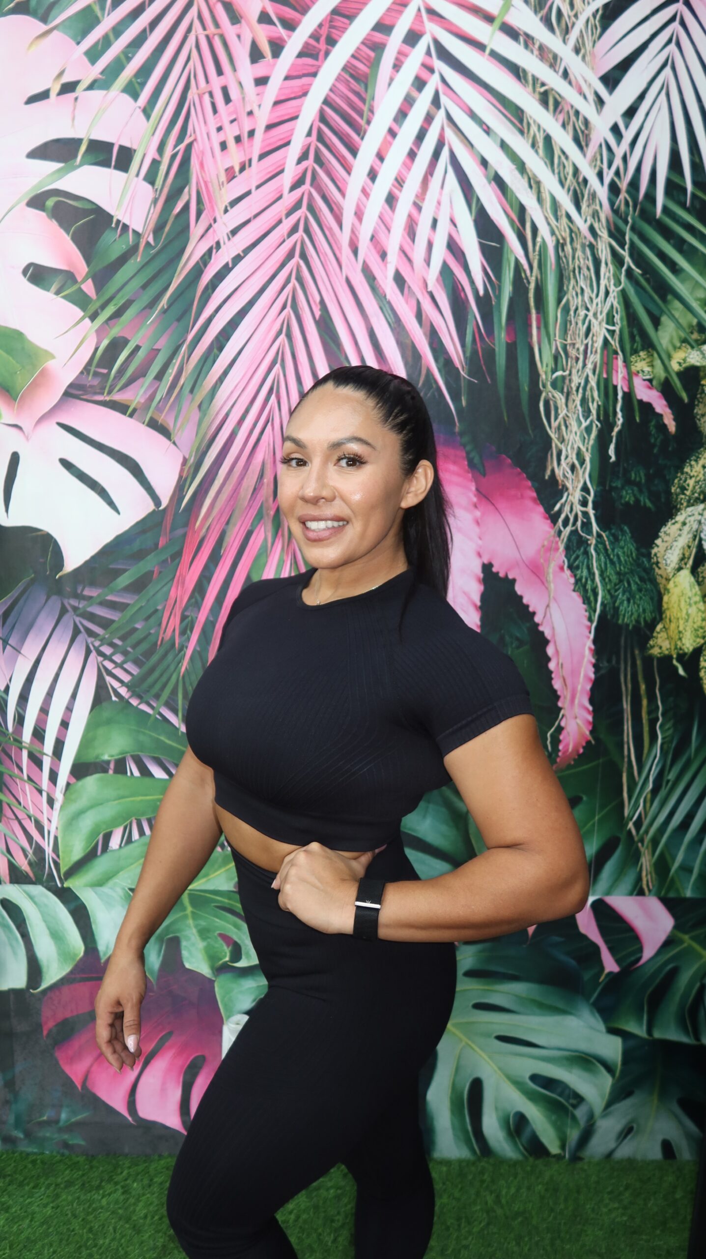 Coach Dee smiling — founder of LOVEHER Women's Gym